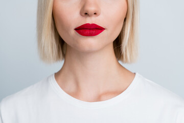 Close up cropped photo of lovely cute girl with bright red tempting plump lips botox isolated on...