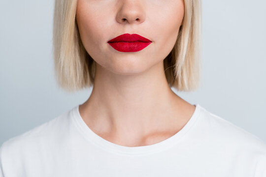 Close up cropped photo of lovely cute girl with bright red tempting plump lips botox isolated on grey color background