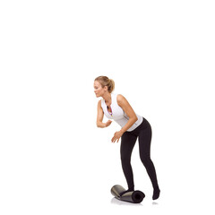 Woman, balance and mat in studio for fitness, pilates or workout for healthy body, wellness or exercise. Person, face and yoga in sportswear for physical activity on mock up space or white background