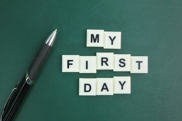 pen and alphabet letters with the word my first day. my first day concept. start day - obrazy, fototapety, plakaty
