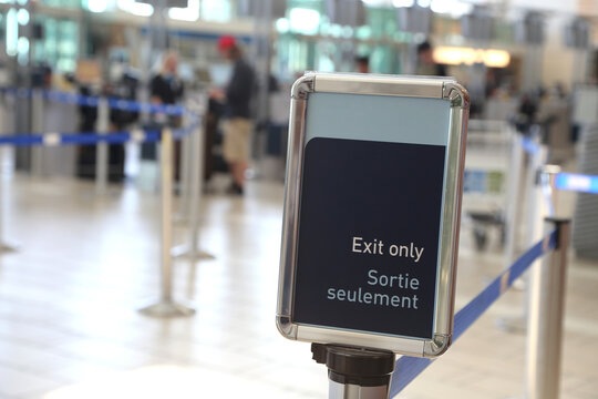 Close up exit sign inside YVR airport