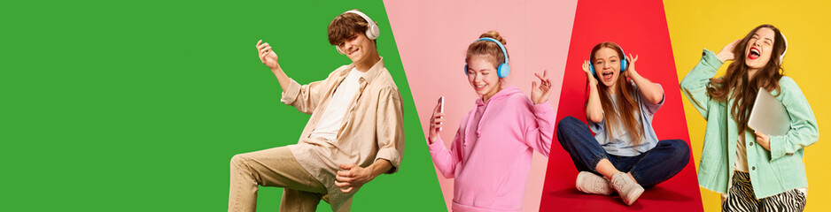 Cheerful young people, students, boys and girls in stylish clothes listening to music in headphones...