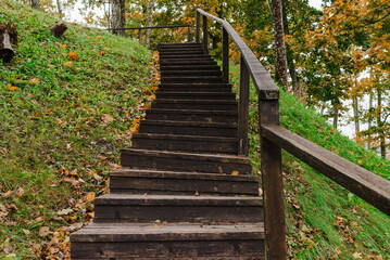 The boardwalk and stairs.Wooden stairs for climbing the mountain. Wooden stairs high in the mountains.Selective focus.