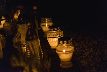 Candles Burning at Night.White Candles Burning in the Dark with lights glow.