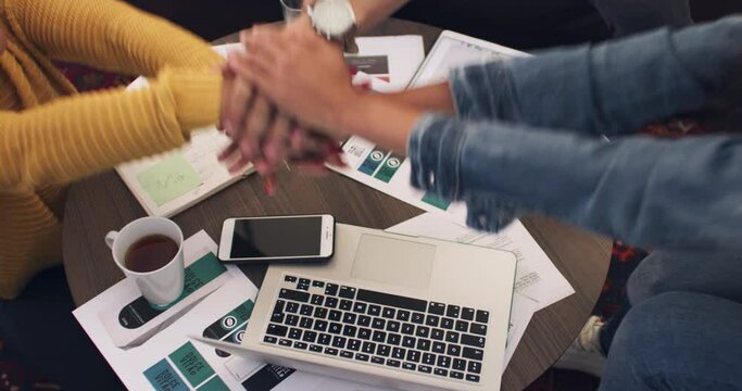Business people, hands and stack in closeup, celebration or support for goals with paperwork, computer and tea. Teamwork, cheers and startup with tablet, documentation and laptop in meeting at desk