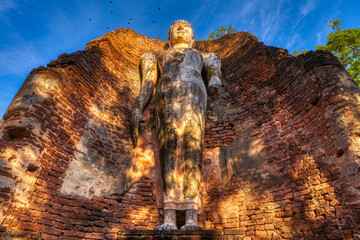 The standing buddha in Kamphaeng Phet Historical Park.