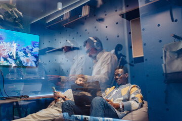 A diverse group of confident entrepreneurs collaborating in a co-working space, working together on new projects and driving profit growth with expertise and persistence.