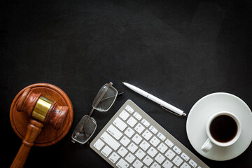 Law student or lawyer workplace with Judge gavel and coffee cup