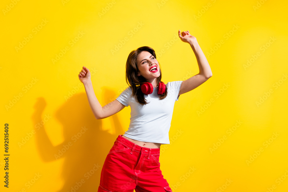 Sticker photo of positive cheerful woman headphones on neck dancing look at black friday promo empty space i