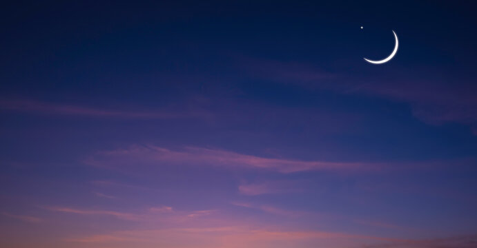 Crescent Moon and Star on panoramic dark blue Twilight Sky, Ramadan Night sky background design for Ramadan Kareem, Eid Mubarak, Eid al adha, Eid al fitr, Islamic New Year