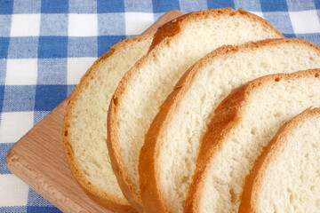 Fresh sliced bread. Closeup on table. - 692516489