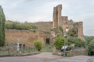 ruins of Rocca Aldobrandesca fortress at medieval village, Sovana, Italy