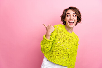 Photo of crazy girl wearing yellow trendy cozy sweater indicate benefits to buy clothes made in...