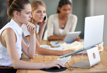 Fashion designer, teamwork and laptop in brainstorming meeting for textile ideas, creative planning or business startup. Artist, women or people thinking on computer and phone call for collaboration