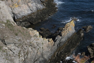 Fototapeta premium What an island tour can offer in terms of rocky landscape variety. Bretagne (West of the country); focusing on eroded rocky formations.