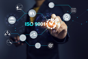ISO 9001 Quality assurance standardization concept with businessman work with assure process and...