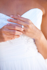 Bride, wedding ring and hand with diamond, jewellery and promise of commitment in marriage. Woman,...