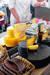 Istra, Russia - August 4, 2023. Smoked sausage and other farm delicacies from the manufacturer are on the counter. Meat products are ready for sale at the fair