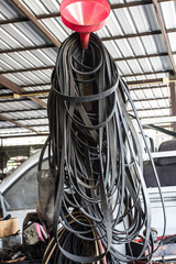 Used engine belts.Used engine belts in a car repair shop.