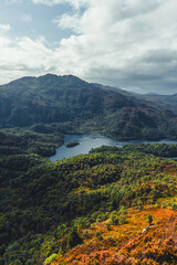 Fototapeta na wymiar Scenic landscape of mountainous terrain of Great Trossachs Forest, Scotland