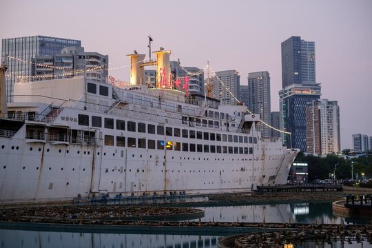 SHENZHEN, CHINA - NOVEMBER 30, 2023: Minghua ship in the center of the Shekou Sea world Plaza area in Shenzhen.