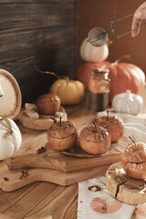 Baked apples with honey and nuts are on the dessert table