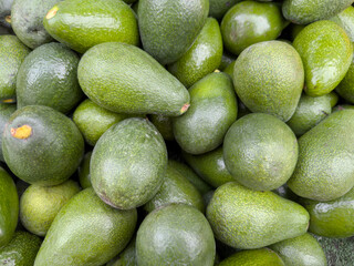 fresh raw avocado on market