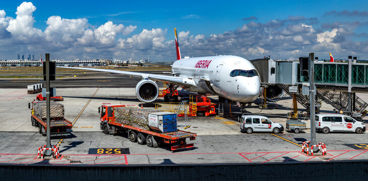 Madrid, Spain; May 31, 2023: Panoramic view of the fabulous airbus A350-900, which is a new-generation wide-body aircraft of the Spanish airline Iberia, parked at Madrid Barajas International Airport.