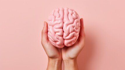 pink brain in palms on pink background - Powered by Adobe
