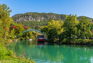Canal de Savières and the pedestrian bridge which crosses it and leads to the village of Chanaz,...