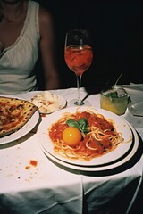 Italian spaghetti pasta mixed with a lightly fried egg and grated cheese. vertical orientation