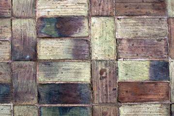 Stone block seamless background. Brick path with different colors stones. Stone pavement, crude...