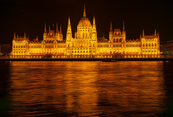 Scenic night scape of the Hungarian Parliament Building on the bank of Danube river in Budapest, Hungary