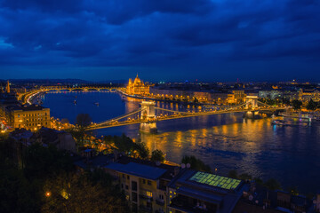 Aerial view of Budapest city from Castle Hill with Danube river, Chain Bridge and Parliament Building at twilight, Budapest, Hungary