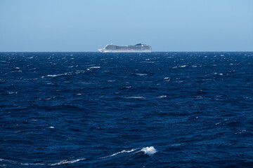 Huge modern cruiseship or cruise ship liner Magnific at sea in summer during Mediterranean cruising...