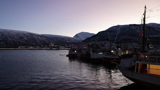 Tromsø harbour with iconic mountain Tromsdalstinden in background.