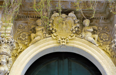 details of ancient buildings in baroque style in the historic center of Lecce Italy