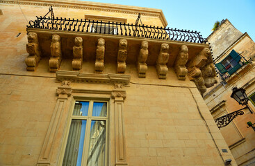 details of ancient buildings in baroque style in the historic center of Lecce Italy