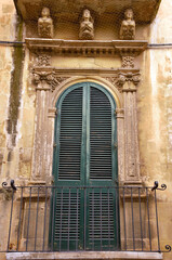 details of ancient buildings in baroque style in the historic center of Lecce Italy