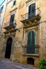 Fototapeta na wymiar details of ancient buildings in baroque style in the historic center of Lecce Italy
