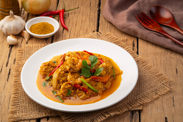 Stir Fried Shrimp with Curry Powder in white plate ,(goong pad pong karee),Thai Food.