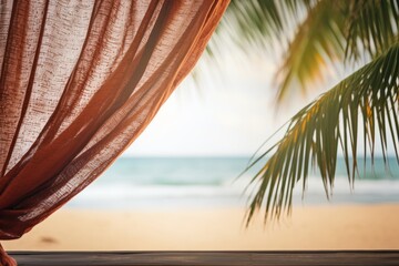 palm tree leaves, curtains on sand and blue sky view. summer vacation in tropical paradise background