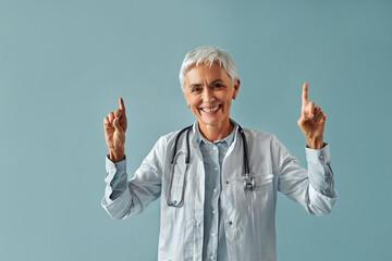 Beautiful, mature, smiling, happy, confident, gray-haired, intelligent professional medical...