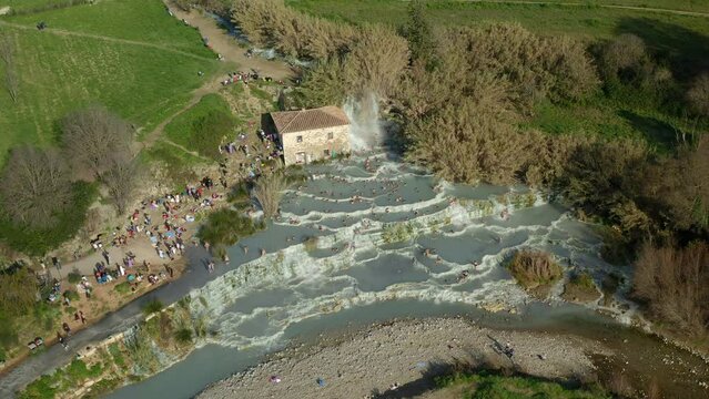 Drone aerial top view of Terme di Saturnia hot springs and landscape in Tuscany, Italy