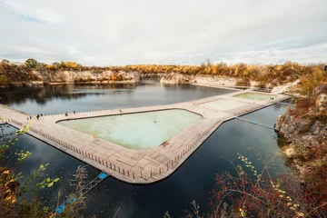 Foto auf Acrylglas  Swimming, paddling pools, sunbathing platforms on Zakrzowek lake famous landmark in Krakow Poland. © alexanderuhrin