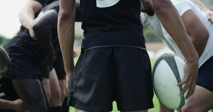 Rugby, sport and team in scrum on pitch, together and game with player defence in stadium. Men, athletes and strong by outdoor for competition training and teamwork for match commitment on field
