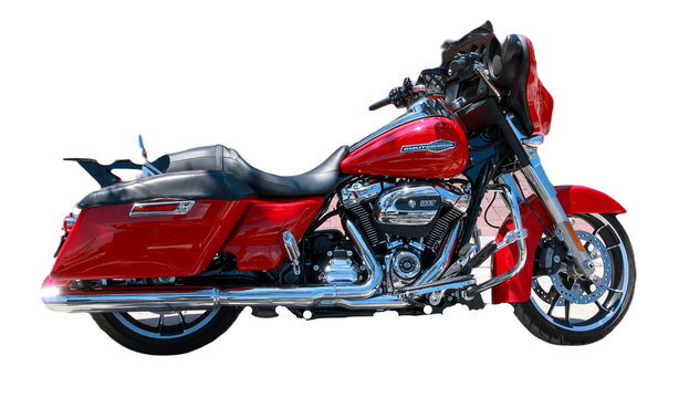 One red Harley Davidson Mortorcycle with a whte background