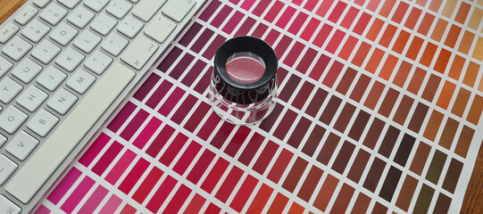 Magnifying glass on series of color palette swatches