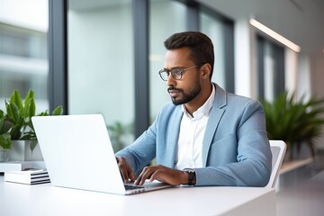 Busy professional business man company employee, male worker software developer, businessman looking at computer thinking on online market analysis using laptop working at office