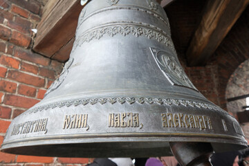 bells and religious symbols made from metal 
